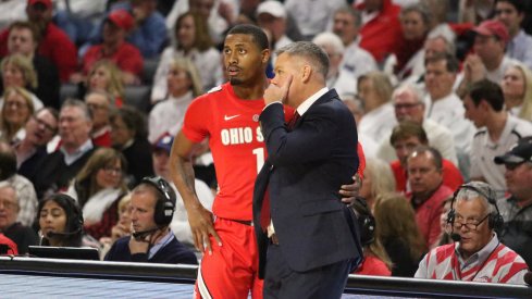 Chris Holtmann and Luther Muhammad