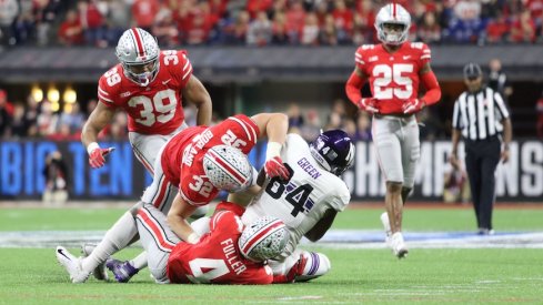 Malik Harrison (39), Tuf Borland (32) and Jordan Fuller (4)