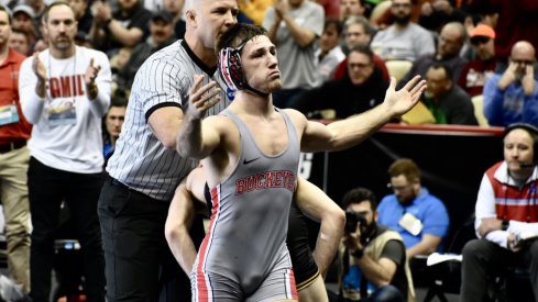 Luke Pletcher celebrates his victory over Austin DeSanto