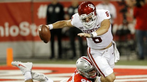 Sep 9, 2017; Columbus, OH, USA; Ohio State Buckeyes defensive lineman Nick Bosa (97) sacks Oklahoma Sooners quarterback Baker Mayfield (6) during the second half at Ohio Stadium. The Oklahoma Sooners won the game 31-16. Mandatory Credit: Joe Maiorana-USA TODAY Sports