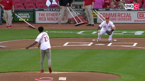 Parris Campbell tosses the opening pitch of the Reds vs. Marlins game.