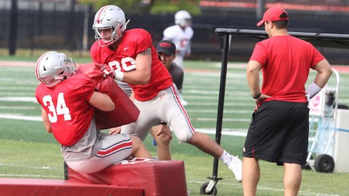 Luke Farrell blocking Mitch Rossi during practice.