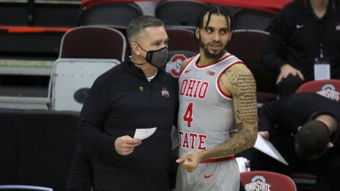 Chris Holtmann and Duane Washington Jr.