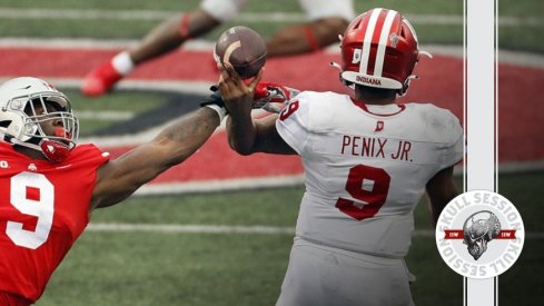 Ohio State Buckeyes defensive end Zach Harrison (9) hits the arm of Indiana Hoosiers quarterback Michael Penix Jr. (9) as he throws the ball during the first quarter in their NCAA Division I football game on Saturday, Nov. 21, 2020 at Ohio Stadium in Columbus, Ohio.