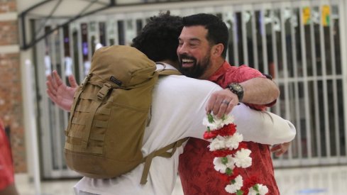 J.T. Tuimoloau and Ryan Day