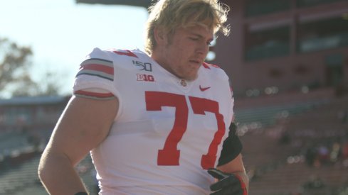 Harry Miller walks off the field.