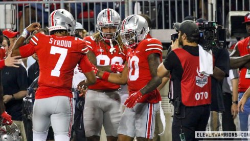 C.J. Stroud celebrates with Xavier Johnson.