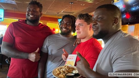 Dawand Jones, Donovan Jackson, Luke Wypler and Matt Jones at Applebee’s