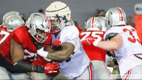 Tegra Tshabola and Carson Hinzman vs. Ohio State’s defensive line in practice