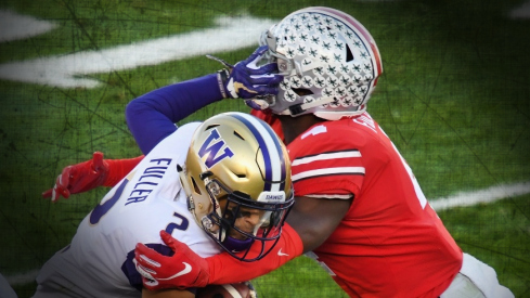 Jan 1, 2019; Pasadena, CA, USA; Washington Huskies wide receiver Aaron Fuller (2) runs against Ohio State Buckeyes safety Jordan Fuller (4) in the first half in the 2019 Rose Bowl at Rose Bowl Stadium. Mandatory Credit: Robert Hanashiro-USA TODAY Sports