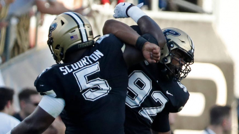 Nic Scourton celebrating a play in Purdue’s win over Illinois