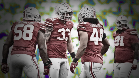 Oct 21, 2023; Columbus, Ohio, USA; Ohio State Buckeyes defensive tackle Ty Hamilton (58), defensive end Jack Sawyer (33) and defensive end JT Tuimoloau (44) celebrate during the NCAA football game against the Penn State Nittany Lions at Ohio Stadium.