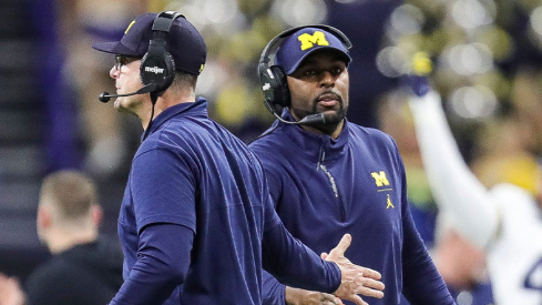 Jim Harbaugh and Sherrone Moore