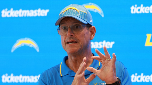 Jul 24, 2024; El Segundo, CA, USA; Los Angeles Chargers head coach Jim Harbaugh speaks to the media after the first day of training camp at The Bolt. Mandatory Credit: Kiyoshi Mio-USA TODAY Sports