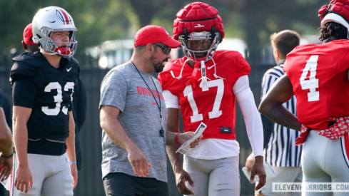 Carnell Tate talking with Ryan Day