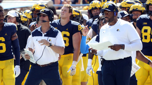 Jim Harbaugh and Sherrone Moore