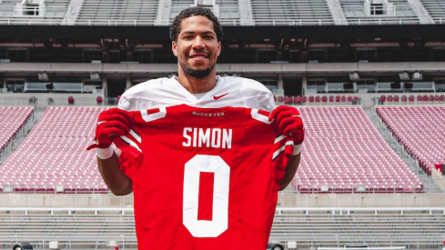 Simon Receives “Block O” Jersey