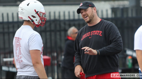 Justin Frye talking to a recruit