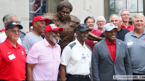 Archie Griffin and his former Ohio State teammates with his new statue