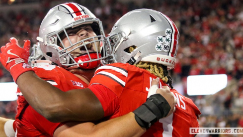 Ohio State center Seth McLaughlin (left) and running back Quinshon Judkins (right)