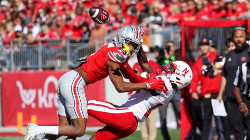 Ohio State corner Davison Igbinosun defends a pass