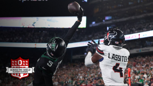 Garrett Wilson making his spectacular one-handed touchdown catch