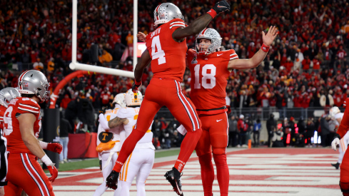 Jeremiah Smith celebrates with Will Howard