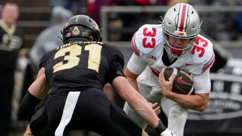 Dillon Thieneman tackling Devin Brown in Ohio State’s 2023 win over Purdue