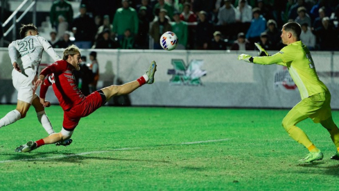 Marshall goalie Aleksa Janjic stops an Ohio State shot on goal