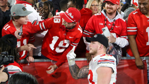 Ohio State defensive lineman Jack Sawyer celebrates with a fan