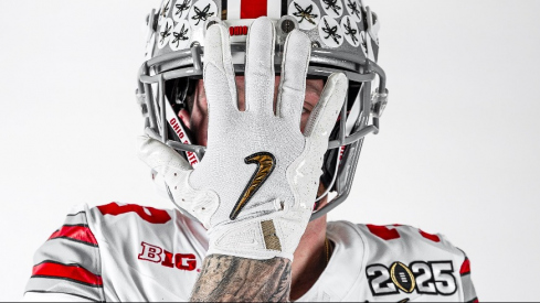 Jack Sawyer wearing Ohio State's white jersey with Heritage Stripes