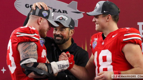 Jack Sawyer, Ryan Day and Will Howard embracing