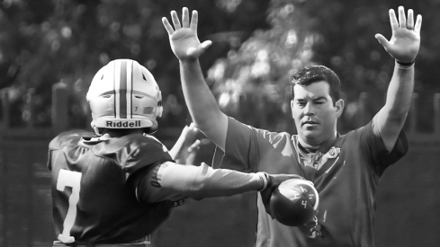 Ohio State Buckeyes acting head coach Ryan Day watches Ohio State Buckeyes quarterback Dwayne Haskins (7) throw during a drill at practice at Woody Hayes Athletic Center in Columbus, Ohio on August 7, 2018. [Kyle Robertson/Dispatch] 1013210418 Ohcol Ryan Day