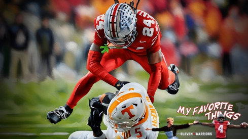 Ohio State Buckeyes cornerback Jermaine Mathews Jr. (24) hits Tennessee Volunteers wide receiver Bru McCoy (5) during the second half of the College Football Playoff first round game at Ohio Stadium in Columbus on Dec. 22, 2024. Ohio State won 42-17.