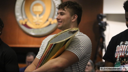 Carson Hinzman with the national championship trophy