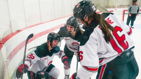 Joy Dunne celebrating with teammates