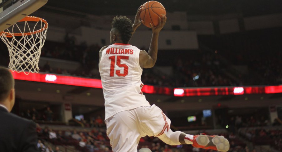 Kam Williams skies for a pregame dunk.