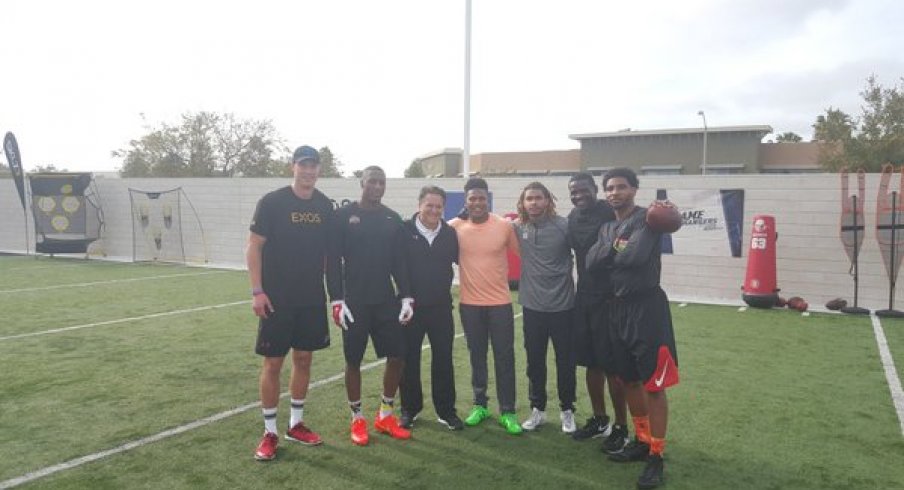 Mike Irvin tutoring Braxton Miller and Michael Thomas