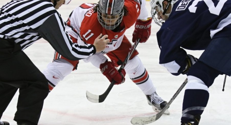 Buckeye forward Christian Lampasso faces off against Penn State.