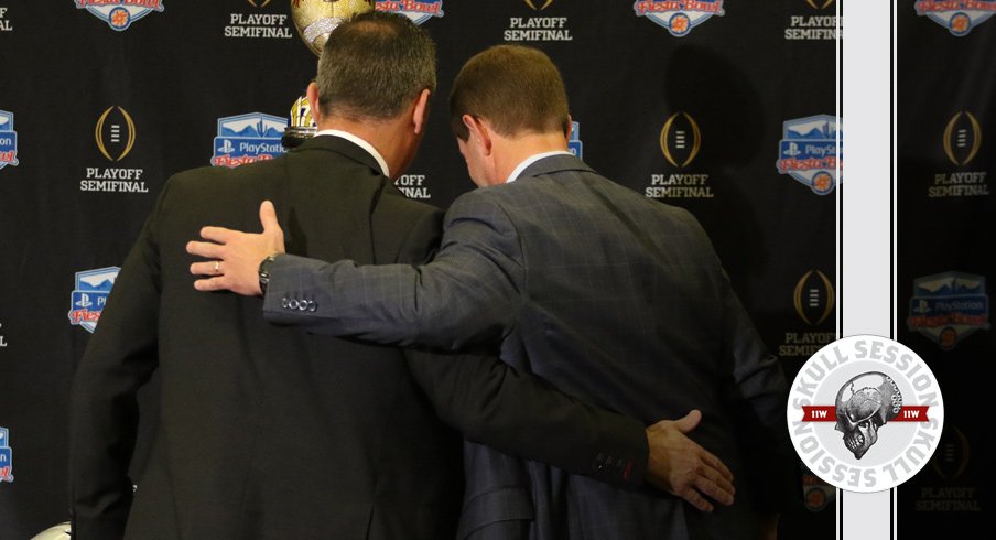 Bill Swinney and Urban Meyer hug for the December 21st 2017 Skull Session