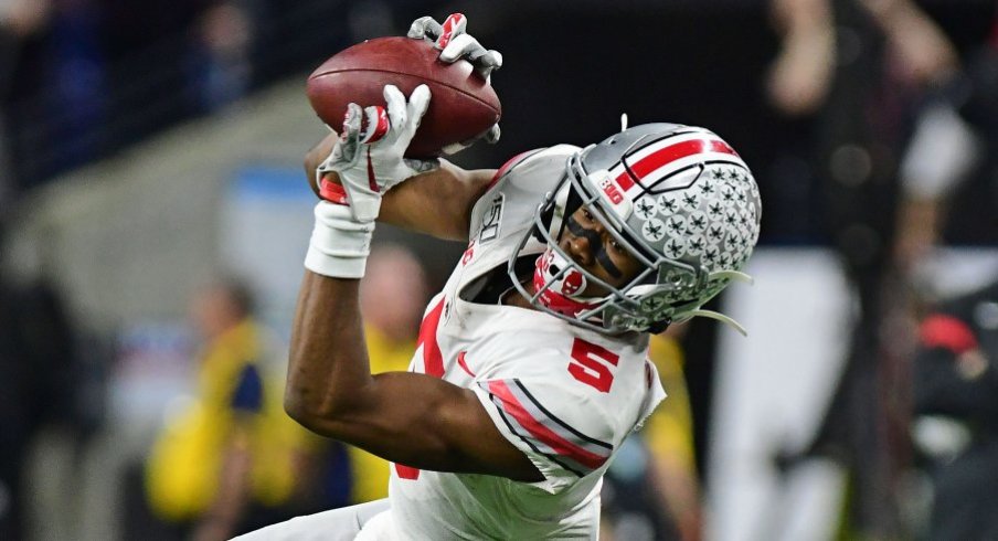 Why does Ohio State football's Garrett Wilson have one reception in two  games? 