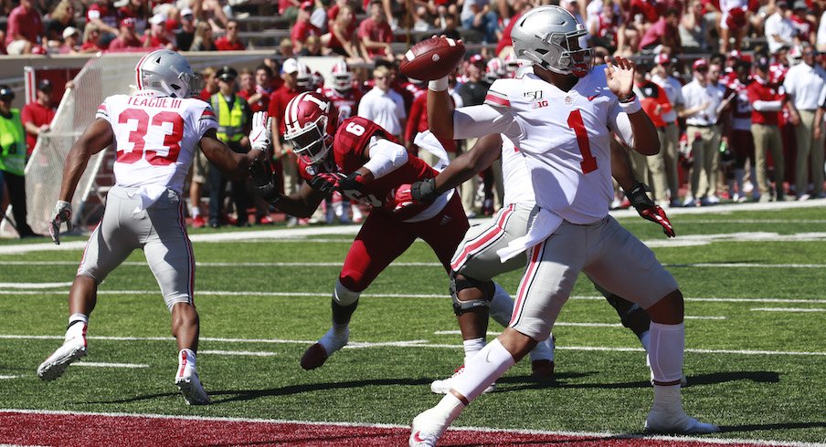 How does Ohio State football's Justin Fields look warming up in preparation  for National Championship? 