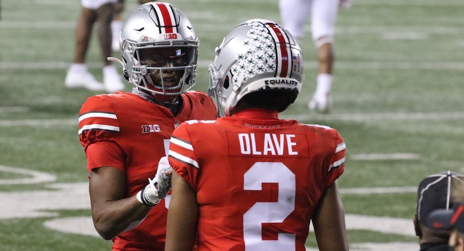 Garrett Wilson vs. Chris Olave: Which Ohio State wide receiver is a better  NFL bet?