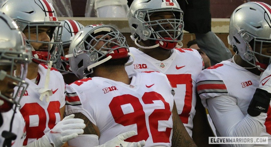 Haskell Garrett scoops and scores for OSU football against Gophers