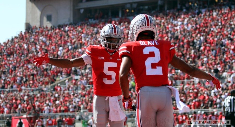 Chris Olave of the Ohio State Buckeyes celebrates after a touchdown