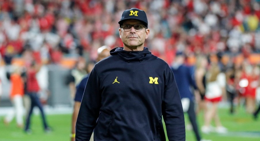 Jim Harbaugh donned a Tigers' uniform and had a great time as