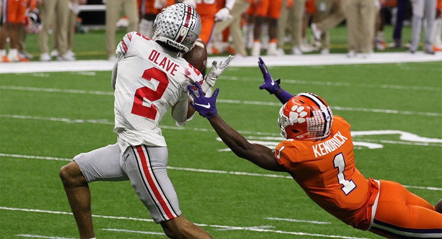 Chris Olave of the Ohio State Buckeyes celebrates after a touchdown