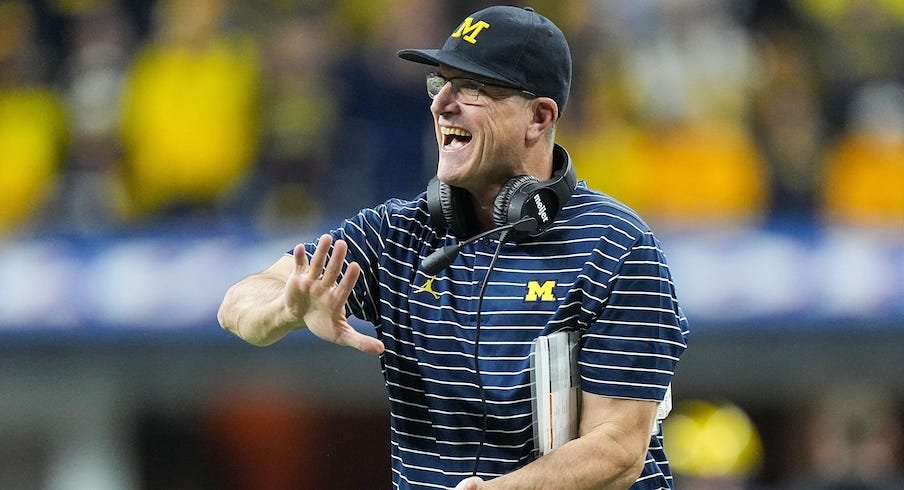 Jim Harbaugh stays in Michigan