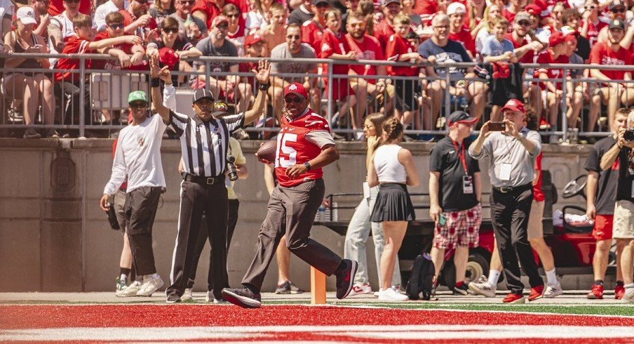 Ohio State football great Archie Griffin runs for a touchdown in the  Buckeyes' spring game 