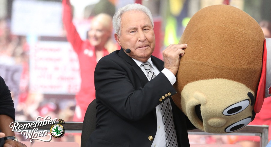 Lee Corso dons the Ohio State mascot headgear on the set of College GameDay